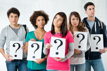 group_of_students_holding_question_mark_sign_450